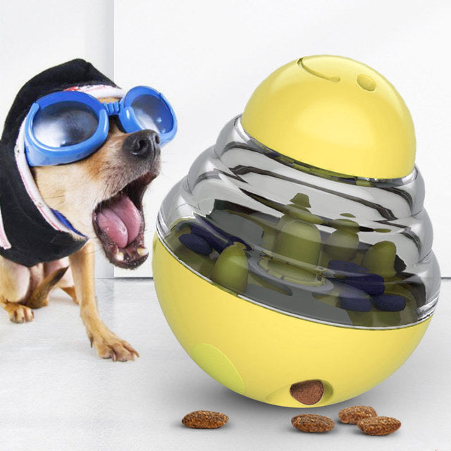 "Dog treat dispensing ball toy in yellow"